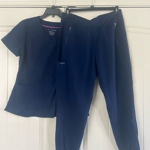 Scrub set. Short sleeve shirt size large. Jogger pants size large. Navy blue